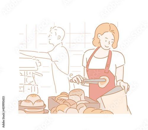 A staff wearing an apron is holding the bread. hand drawn style vector design illustrations. 