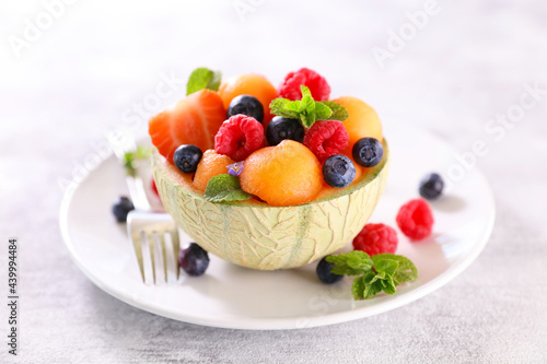 Fototapeta Naklejka Na Ścianę i Meble -  fruit salad with melon and berries fruits