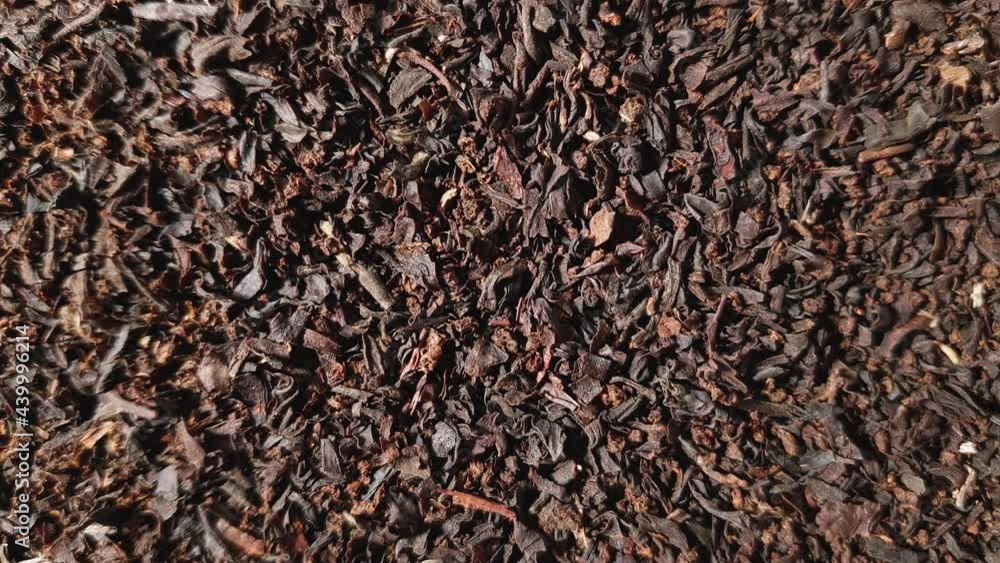 Close up of black dry Ceylon tea. Breakfast relaxing and health concept. Use us background with copy space Close up of black dry Ceylon tea. Breakfast relaxing and health concept. Use us background with copy space