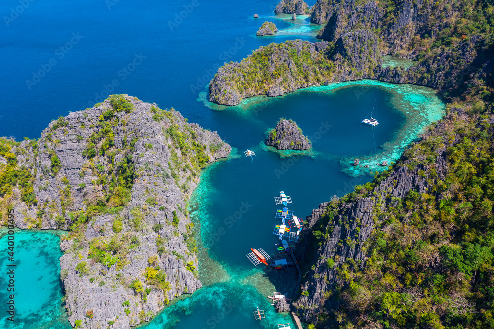 Aerial view of beautiful lagoons and limestone cliffs on Coron, Palawan, Philippines.