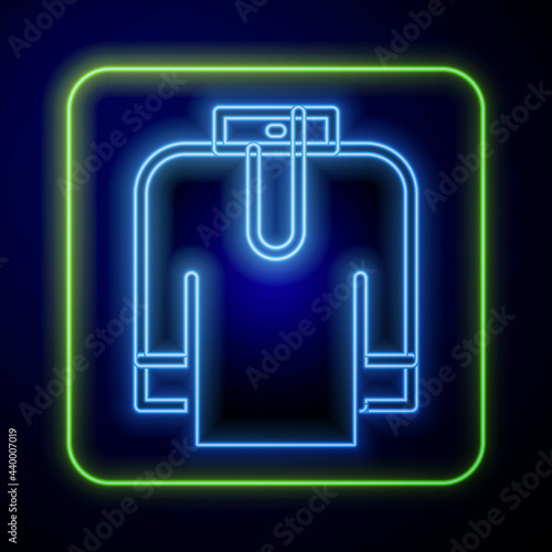 Glowing neon Shirt kurta icon isolated on blue background. Vector