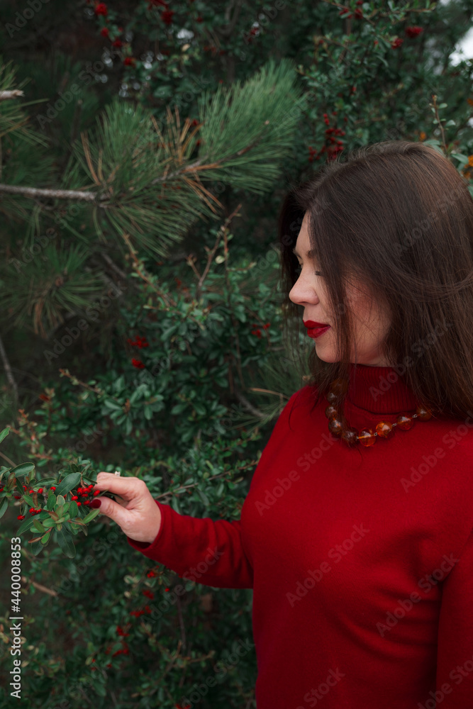 Portrait of a gorgeous middle-aged woman in an autumn park Portrait of a gorgeous middle-aged woman in an autumn park
