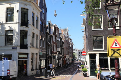 Amsterdam Street View with Traditional Buildings and People