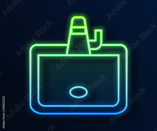 Glowing neon line Washbasin with water tap icon isolated on blue background. Vector