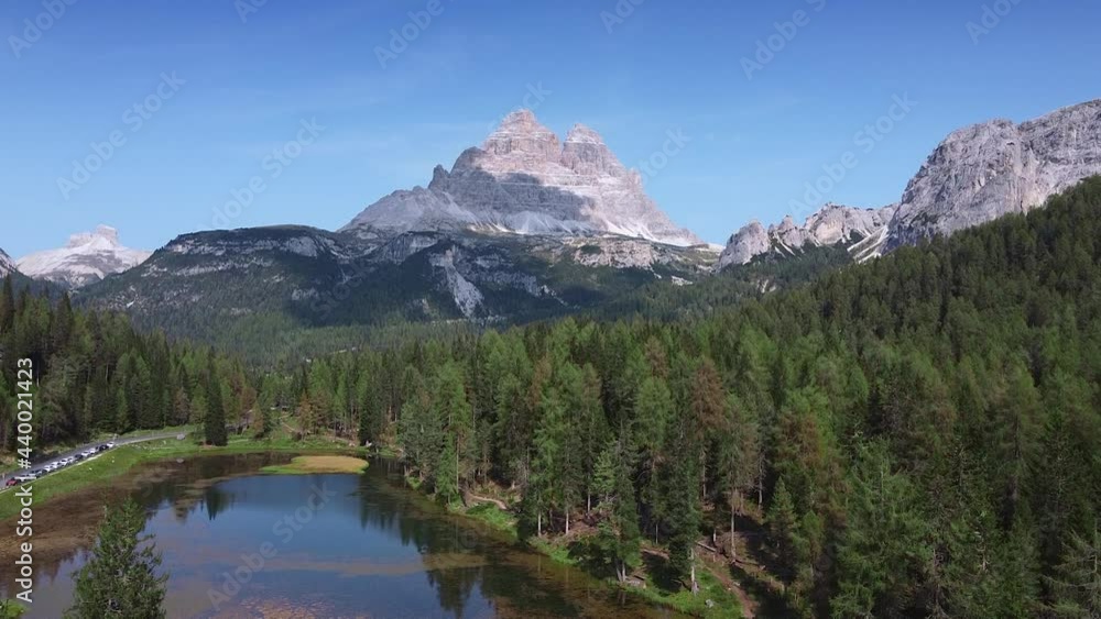 Amazing view of the Three peaks of Lavaredo in Dolomites, Italy. Lake at the foot of the mountain. Aerial drone view Amazing view of the Three peaks of Lavaredo in Dolomites, Italy. Lake at the foot of the mountain. Aerial drone view