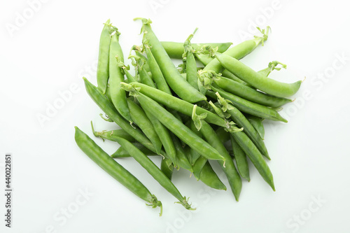 Tasty fresh green pea on white background