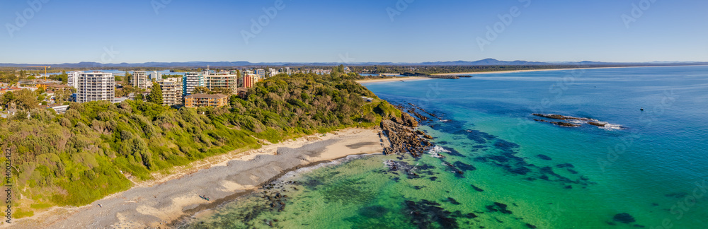 Pebbly Beach Aerial Morning Shorescape Panorama with High Rises