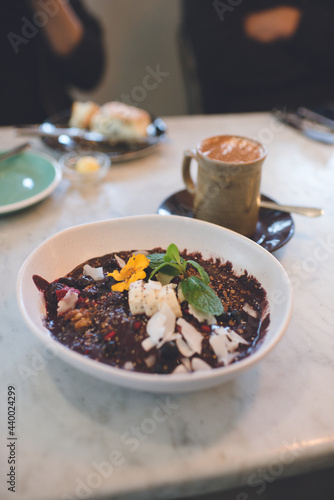 Granola bowl  & Flat White, Cafe in Auckland, New Zealand