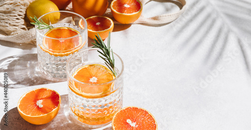 Tela Summer orange cocktails with fresh citrus fruits