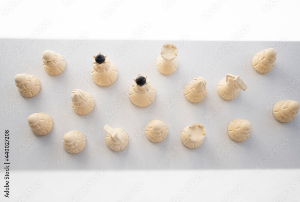 chess, white pieces on a light table surface, indoors. Intellectual games for children and adults, logic, thinking, chess on the table chess, white pieces on a light table surface, indoors. Intellectual games for children and adults, logic, thinking, chess on the table