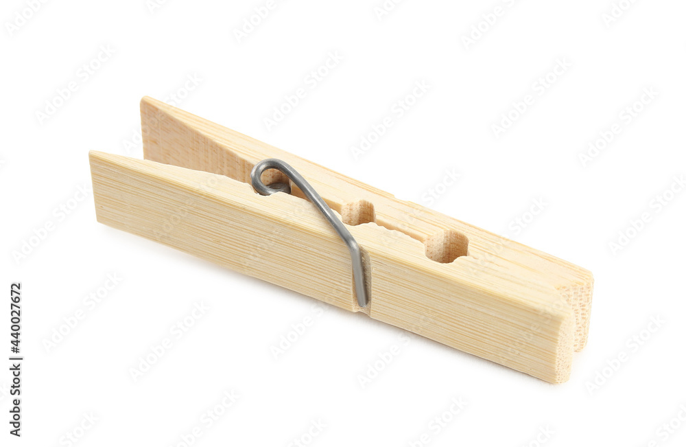 One classic wooden clothespin isolated on white One classic wooden clothespin isolated on white