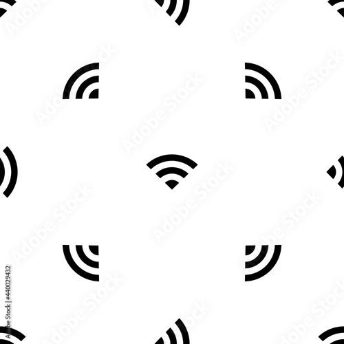 Seamless pattern of repeated black wifi symbols. Elements are evenly spaced and some are rotated. Vector illustration on white background