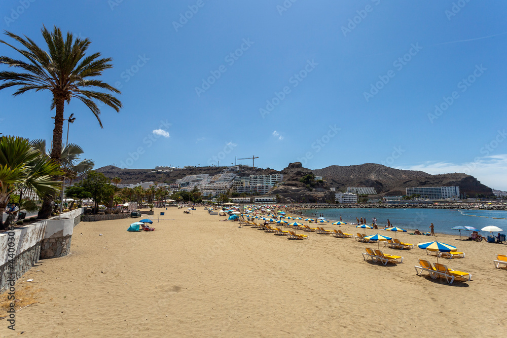 The village of Puerto Rico and the beach on Gran Canaria
