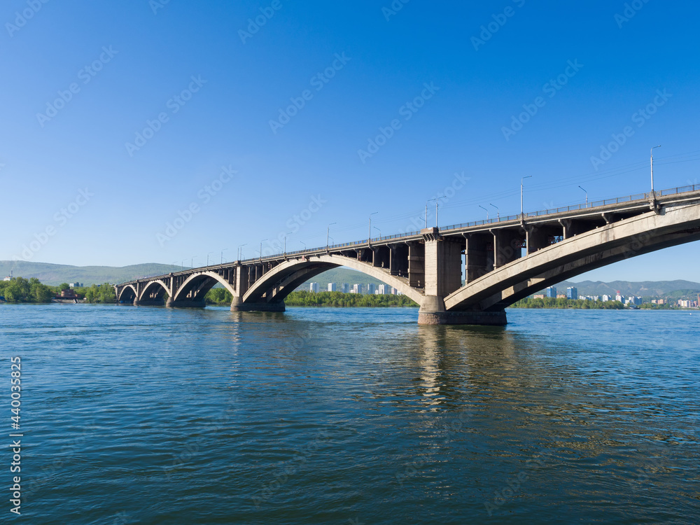 Krasnoyarsk city. Communal bridge over the Yenisei River. Summer sunny day