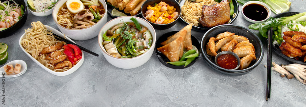 Assorted asian dishes and snacks on dark gray background. Traditional food concept. Assorted asian dishes and snacks on dark gray background. Traditional food concept.