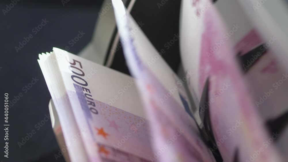Machine counter automatic calculates a large amount of Euro banknotes in 4K Slow motion 60fps Machine counter automatic calculates a large amount of Euro banknotes in 4K Slow motion 60fps