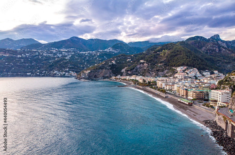Naklejka premium Aerial drome sunset view of resort village Minori Amalfi coast Italy
