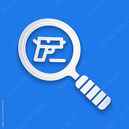 Paper cut Pistol or gun search icon isolated on blue background. Police or military handgun. Small firearm. Paper art style. Vector
