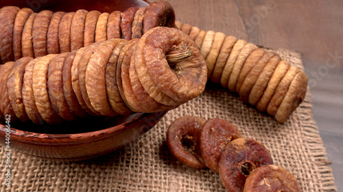 Fresh Figs or Anjeer fruit healthy vegan food concept organic dry fruits on wooden background. photo