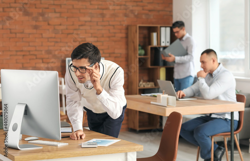 Male accountants working in office