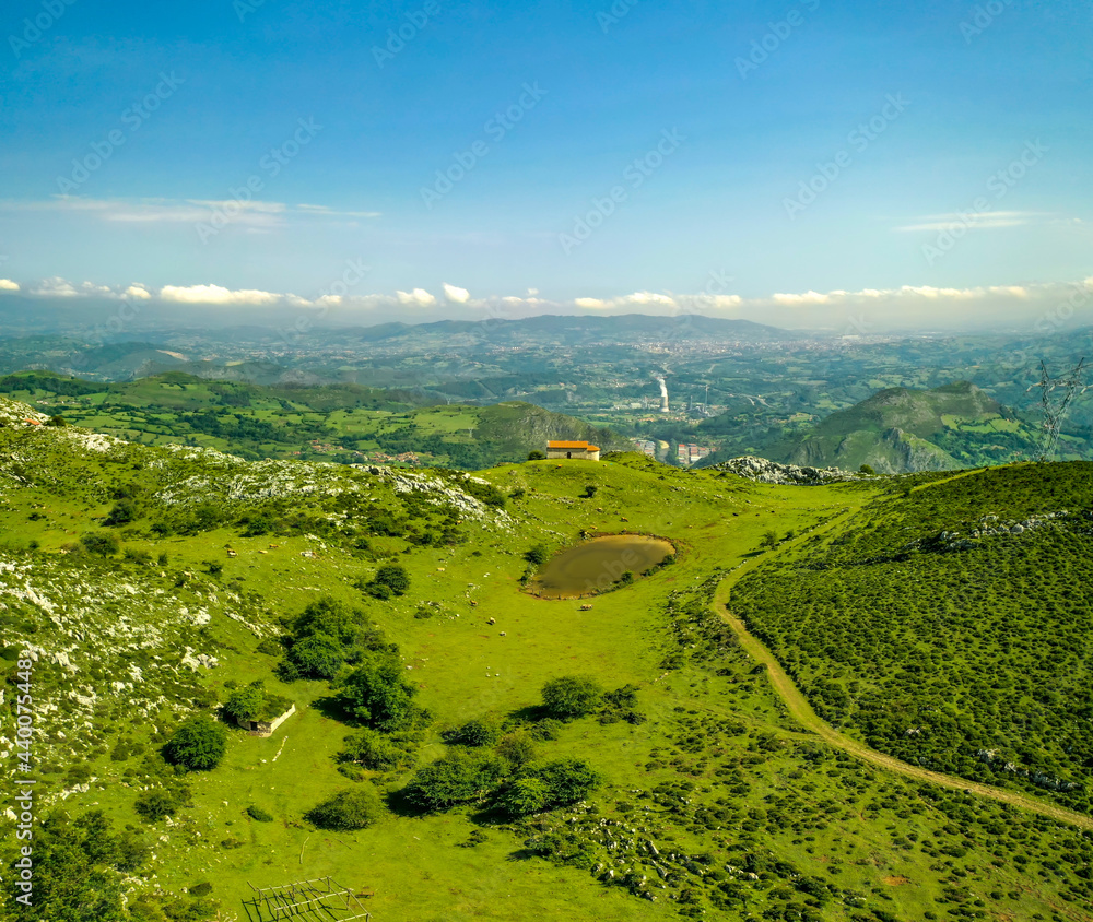 aerial view of the route to Monsacro peak. Hermitage of Santiago and Hermitage of La Magdalena. Asturias