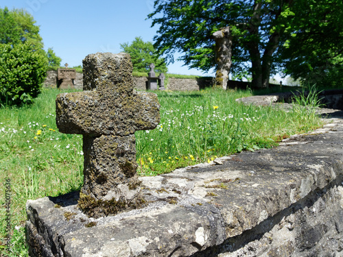 Kreuz am Friedhof der Alte Kirche bei Alendorf  in der Eifel / Deutschland photo