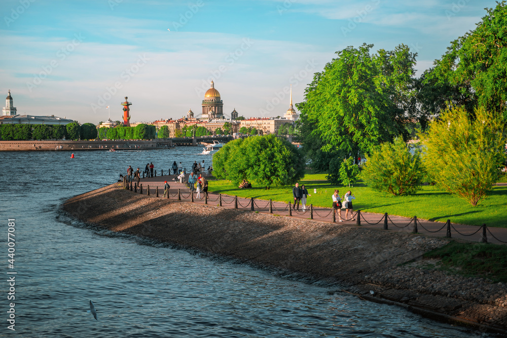 Beautiful view of St. Isaac's Cathedral from the Neva River embankment on a summer day, postcard view. Saint Petersburg, Russia - 05 Apr 2021