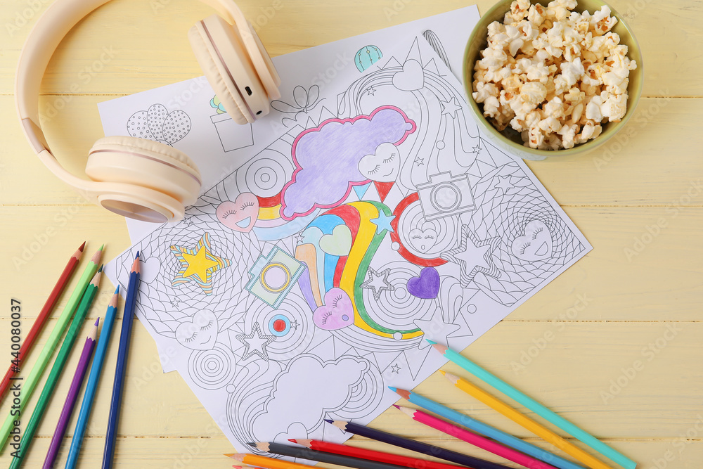 Obraz premium Composition with coloring picture on wooden background