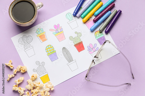 Composition with coloring picture on table