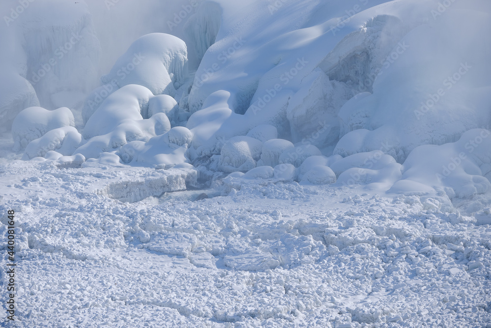 Ice floes and frozen water and rocks at the bottom of Niagara Falls Ontario Canada Ice floes and frozen water and rocks at the bottom of Niagara Falls Ontario Canada