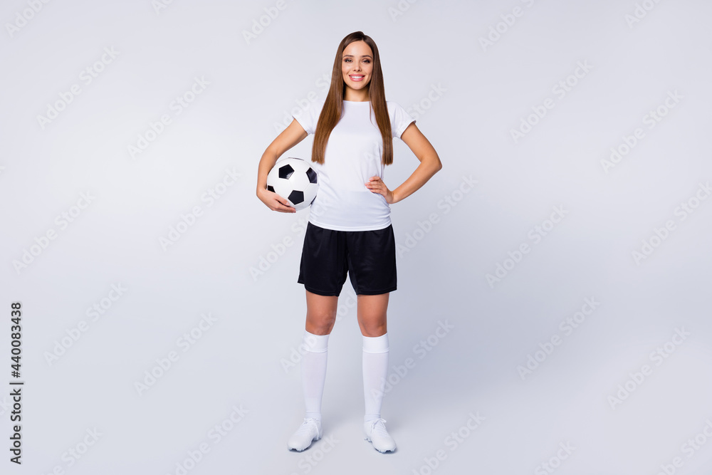 Full length photo of sporty shapes captain lady player soccer women team hold leather ball wear football uniform t-shirt shorts boots knee socks isolated white color background Full length photo of sporty shapes captain lady player soccer women team hold leather ball wear football uniform t-shirt shorts boots knee socks isolated white color background