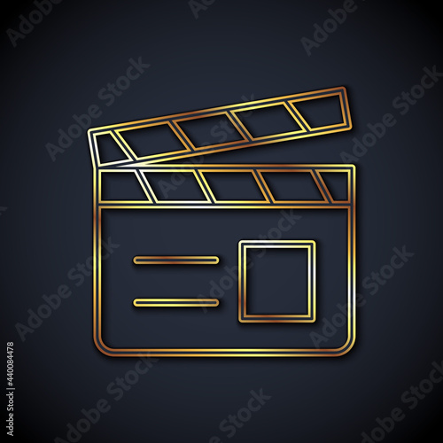 Gold line Movie clapper icon isolated on black background. Film clapper board. Clapperboard sign. Cinema production or media industry. Vector