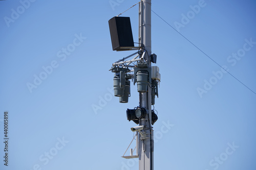 An example of installation on a street lighting pole of sound and light equipment, a wi-fi router and a surveillance camera