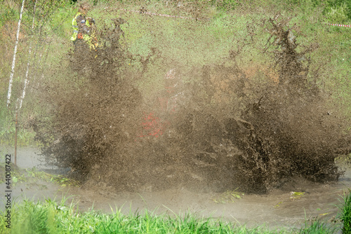 Fotografija MOSCOW, RUSSIA - MAY 22, 2021: Falling on an ATV into a puddle