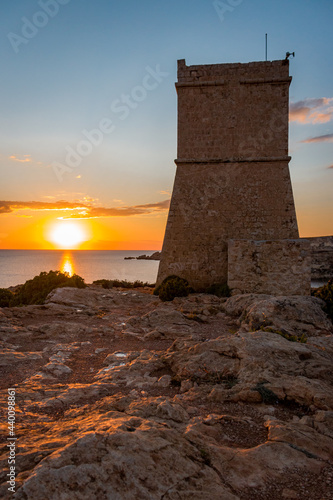 Great view and landscape of Malta joining the watchtowers with sunset