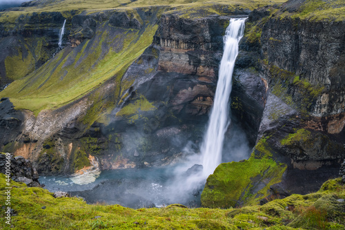 Haifoss waterfall in Iceland - one of the highest waterfall in Iceland, popular tourist destination.