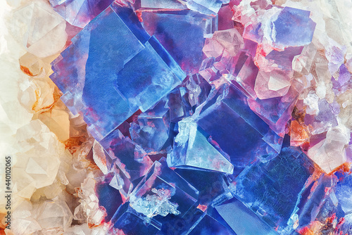 Amazing colorful macro closeup of blue or cobalt rare fluorite mineral specimen isolated as a background. Natural mineral gem stone (fluorspar). Natural cubic texture - Fluorite crystals detail
