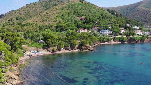 Panoramic on the beautiful crystal clear sea of ​​Ogliastro Marina bay, Cilento, Italy.
Aerial view of the typical Cilento coast with the trees on the rocks photo