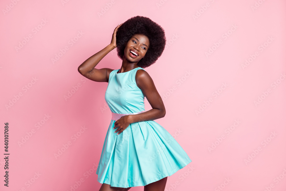 Photo of young happy excited smiling charming african girl look copyspace dancing isolated on pink color background Photo of young happy excited smiling charming african girl look copyspace dancing isolated on pink color background