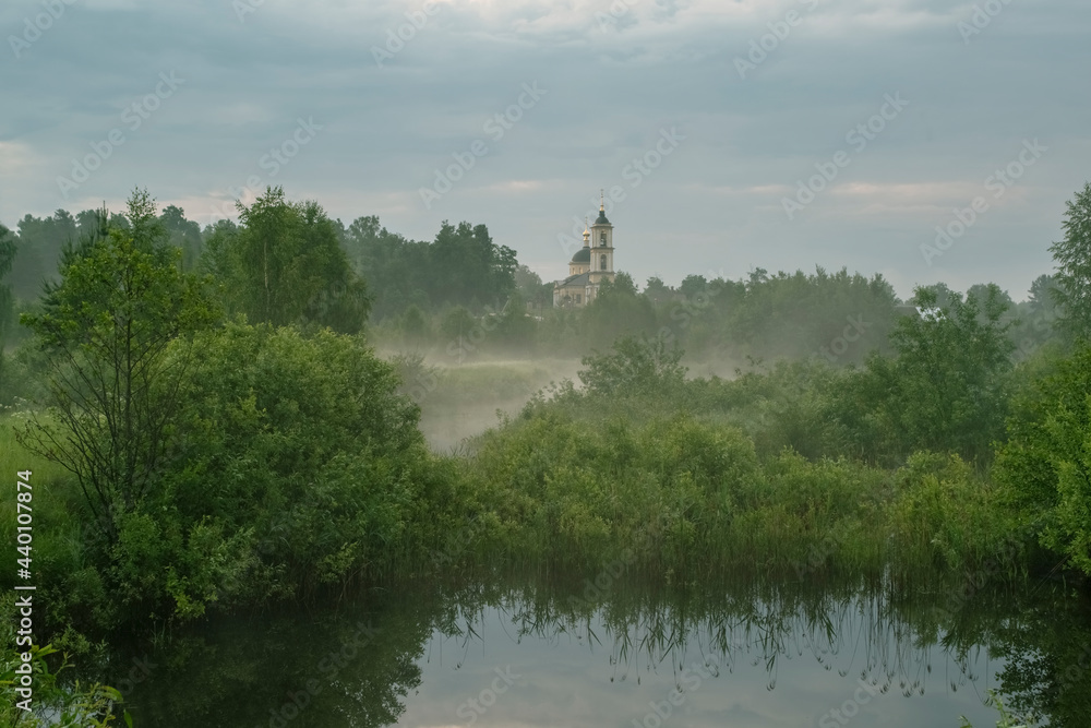 Temple of the Bright Resurrection of Christ. Orthodox Christianity. Early morning, fog, lake. Vladimir region, Russia