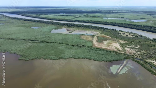 Panorama of Ermakov island, camera rotation to the left side. Aerial view, 4K-60fps. Danube Biosphere Reserve in Danube delta. Danube delta, Vylkove District, Odessa oblast, Ukraine photo