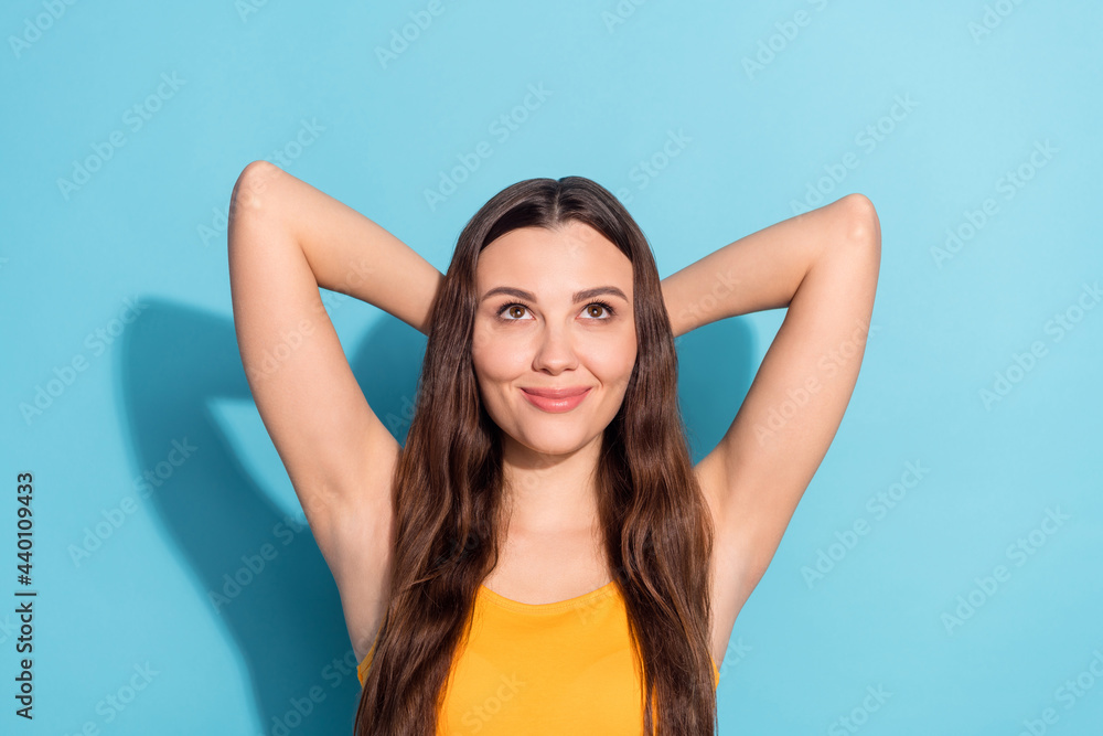 Photo portrait girl smiling chilling on work break looking copyspace isolated pastel blue color background Photo portrait girl smiling chilling on work break looking copyspace isolated pastel blue color background