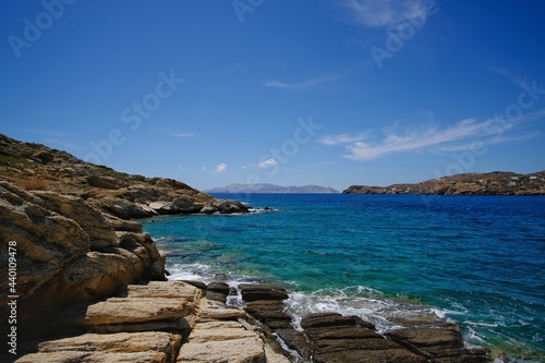 Beautiful turquoise waters next to rocks in Ios cyclades Greece  photo