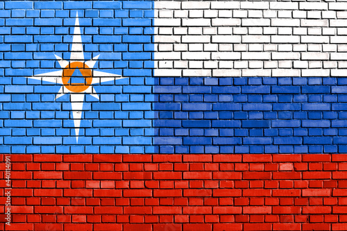 flag of Russian Ministry of Extraordinary Situations painted on brick wall