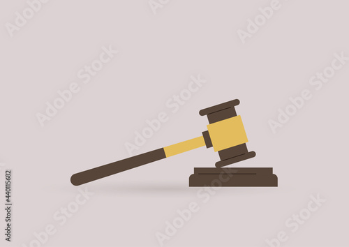A wooden judge gavel, an auction hammer