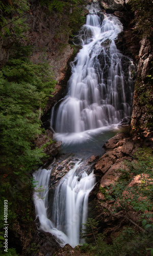 Fototapeta Naklejka Na Ścianę i Meble -  Magical waterfalls in the middle of a forest