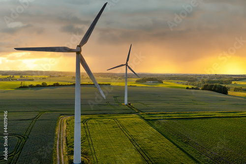 Wind turbines that produce electricity, built on a field in Skanderborg, Denmark	
