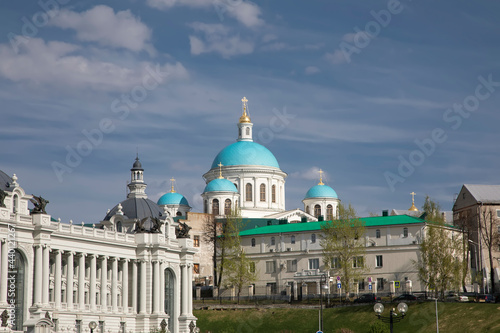 A beautiful large church with blue domes. Palace and ancient architecture. Sunny day. Blue sky.