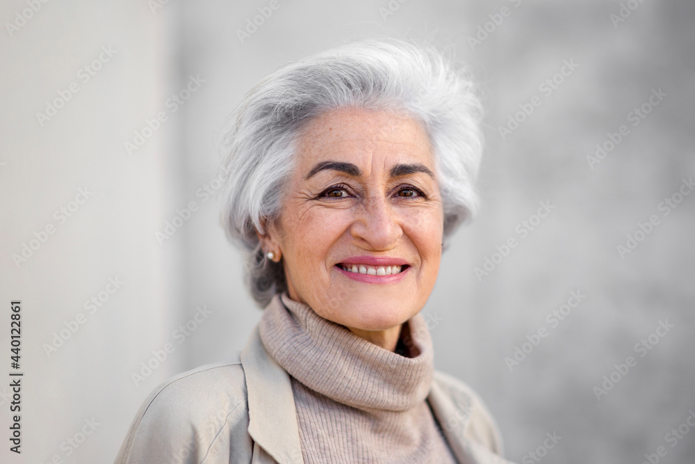 Woman with gray hair smiling Woman with gray hair smiling