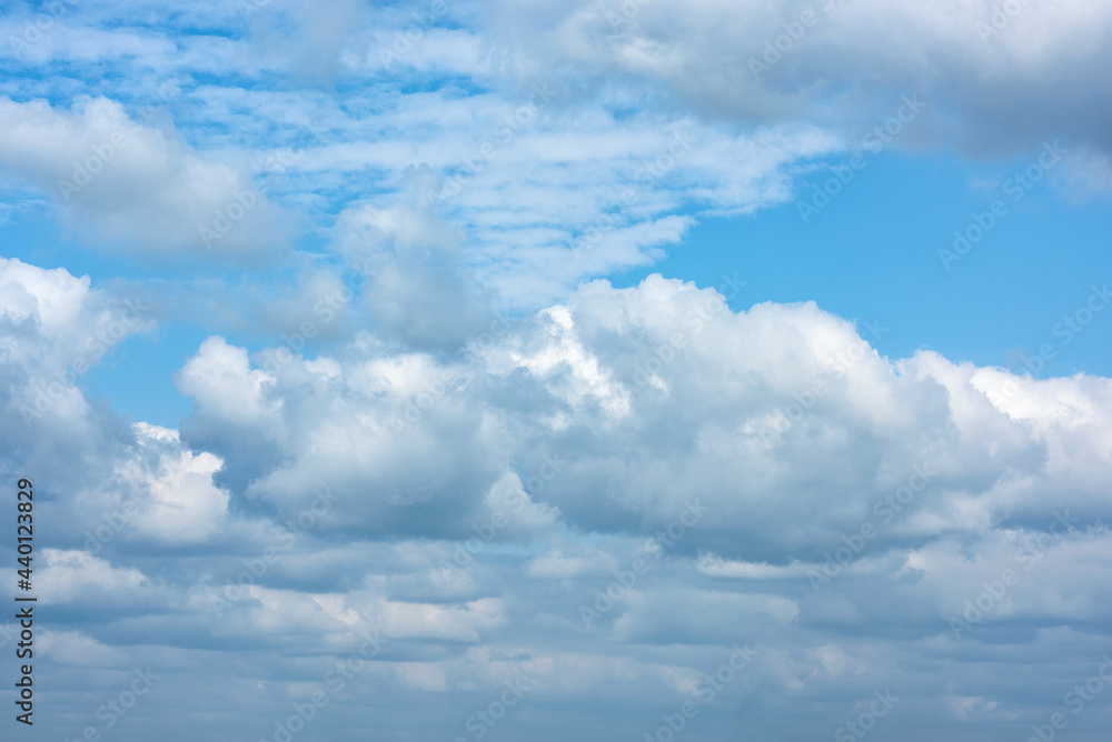 Fluffy white clouds on background of blue sky. Fluffy white clouds on background of blue sky.